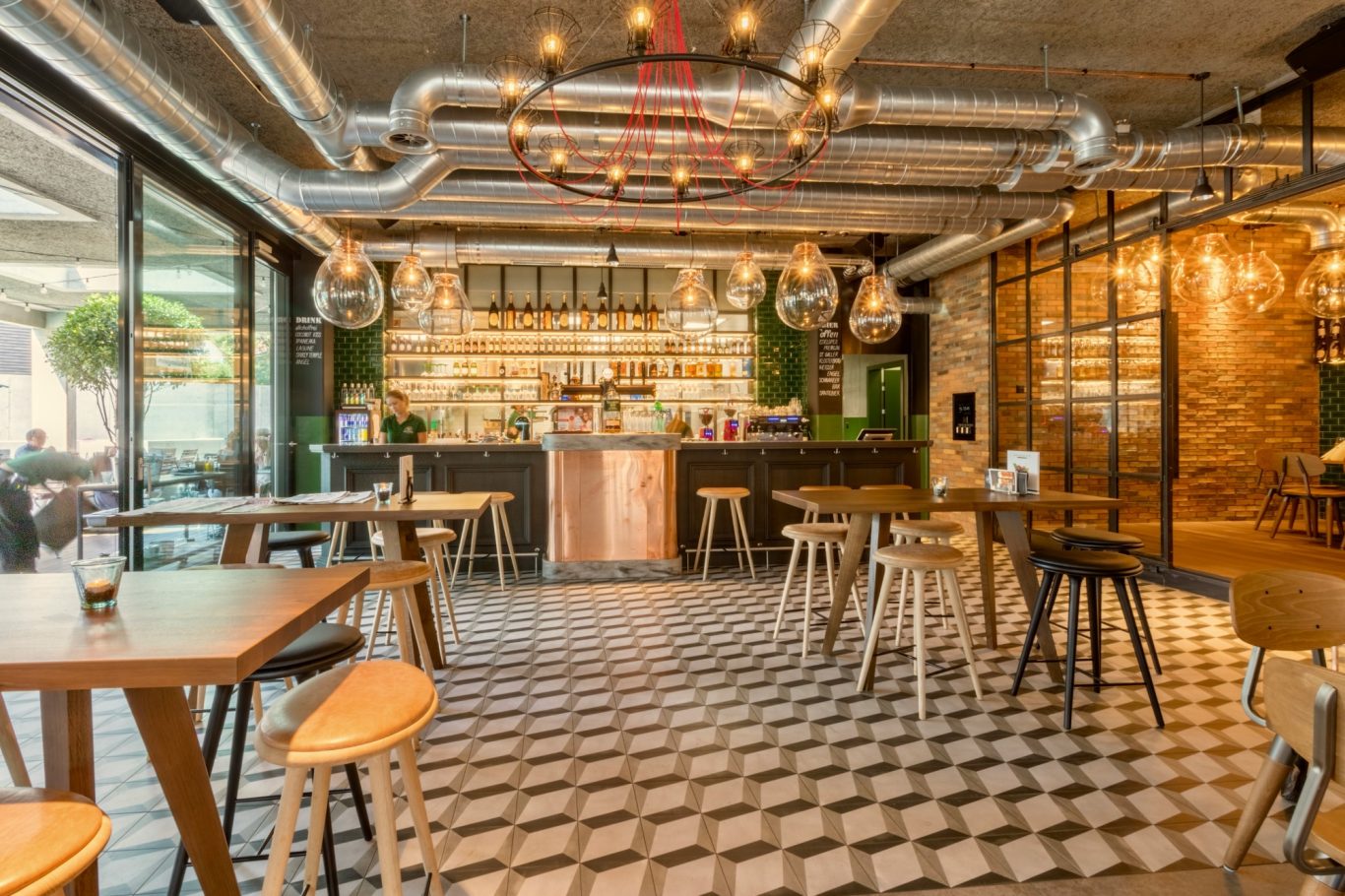 Industrial-Themed Bar – Interior Design Industrial-themed bar interior with distinctive finishes and features