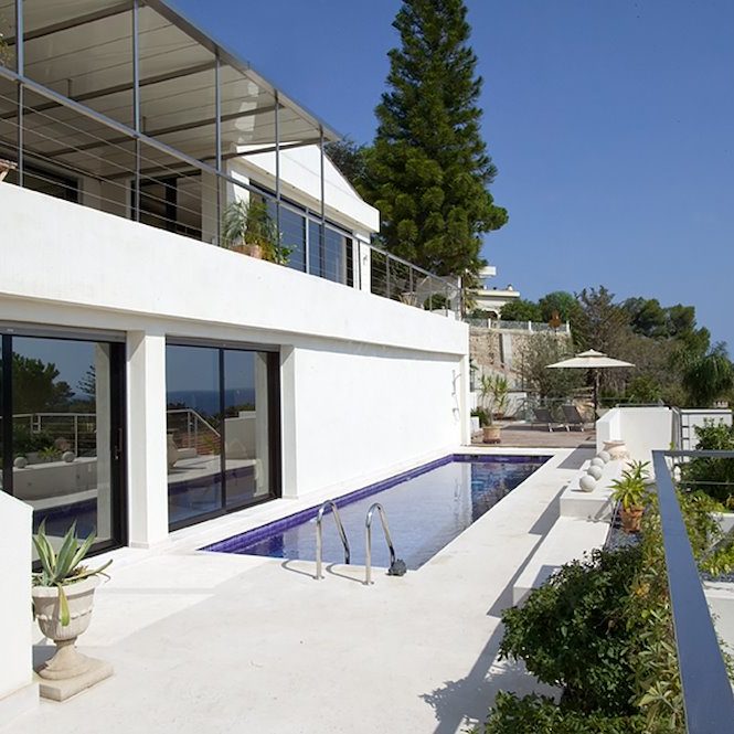 Exterior of a luxury villa in Monaco with swimming pool