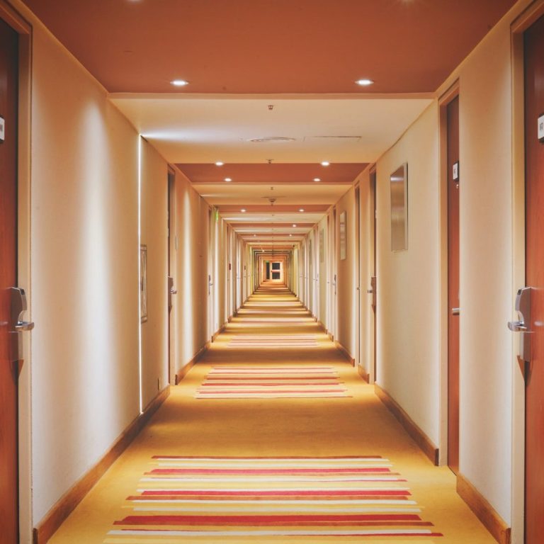 Hotel corridor with guest room entrances